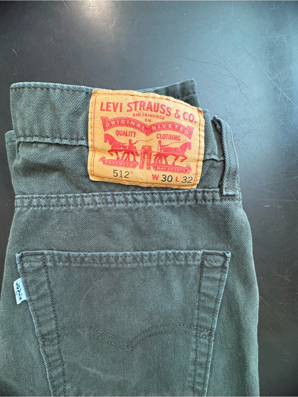 Levi's Slim Jeans in Olive Green with Leather Patch